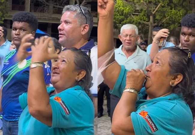 Canta "Ay mi Chinita" con las manos al cielo: la fe de una mujer en el Potazo Chiquinquireño en el lente del periodista Mario Lobo